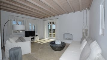 Deluxe Villa, 3 Bedrooms, Private Pool | Living area | Flat-screen TV, fireplace, MP3 dock