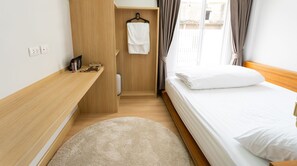 Premium bedding, blackout curtains, free WiFi, bed sheets
