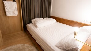 Premium bedding, blackout curtains, free WiFi, bed sheets