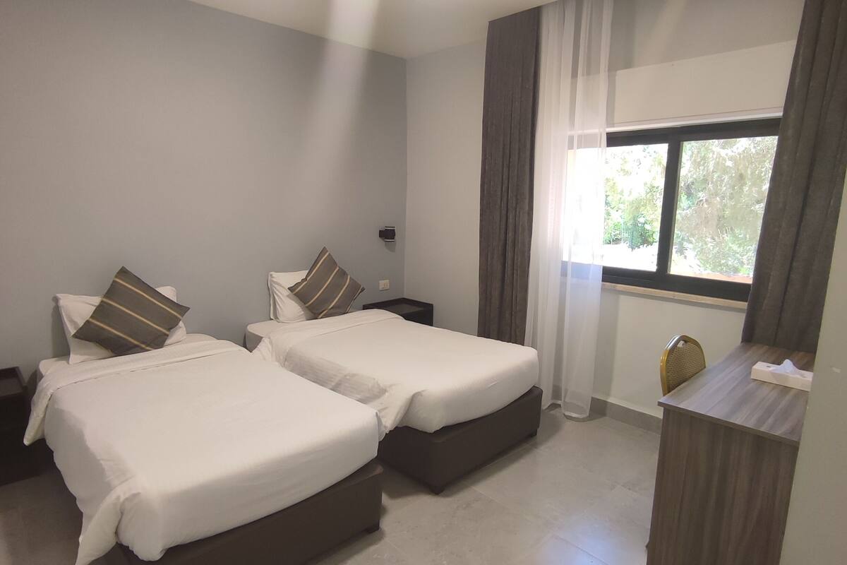 Twin Room, 2 Twin Beds | In-room safe, desk, blackout drapes, cribs (free)