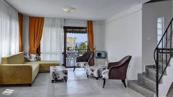 Villa | Living room | 24-inch LCD TV with satellite channels