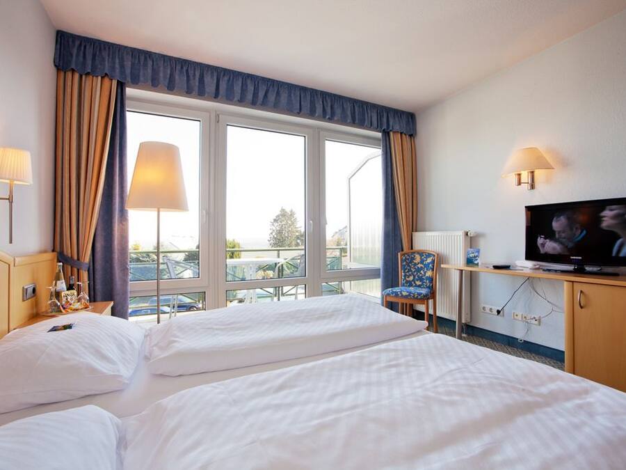 Desk, blackout drapes, soundproofing, iron/ironing board