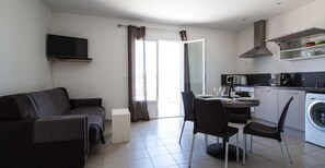Apartment, Terrace | Living area | Flat-screen TV