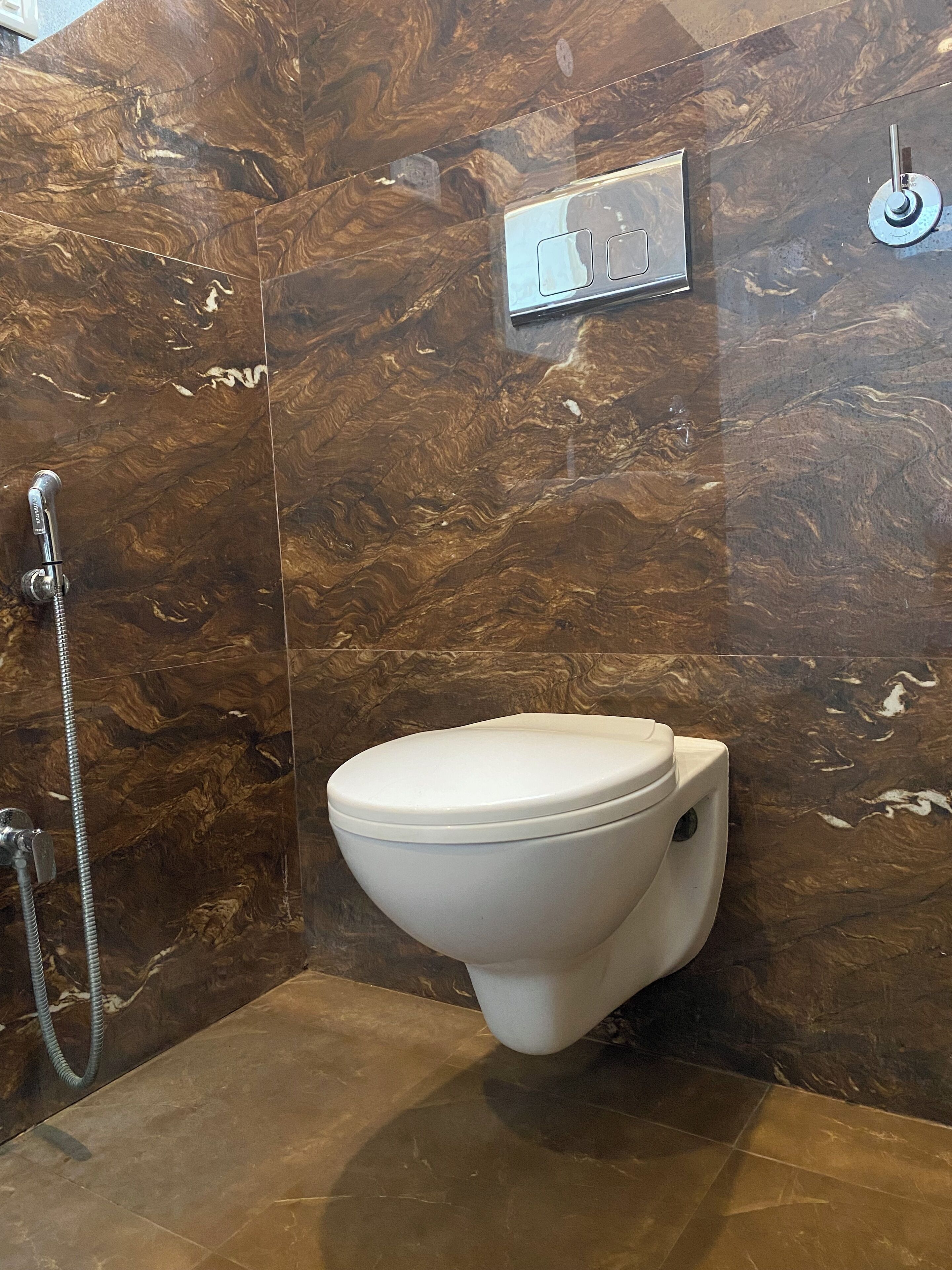 deluxe bedroom | bathroom | shower, towels, soap, toilet paper