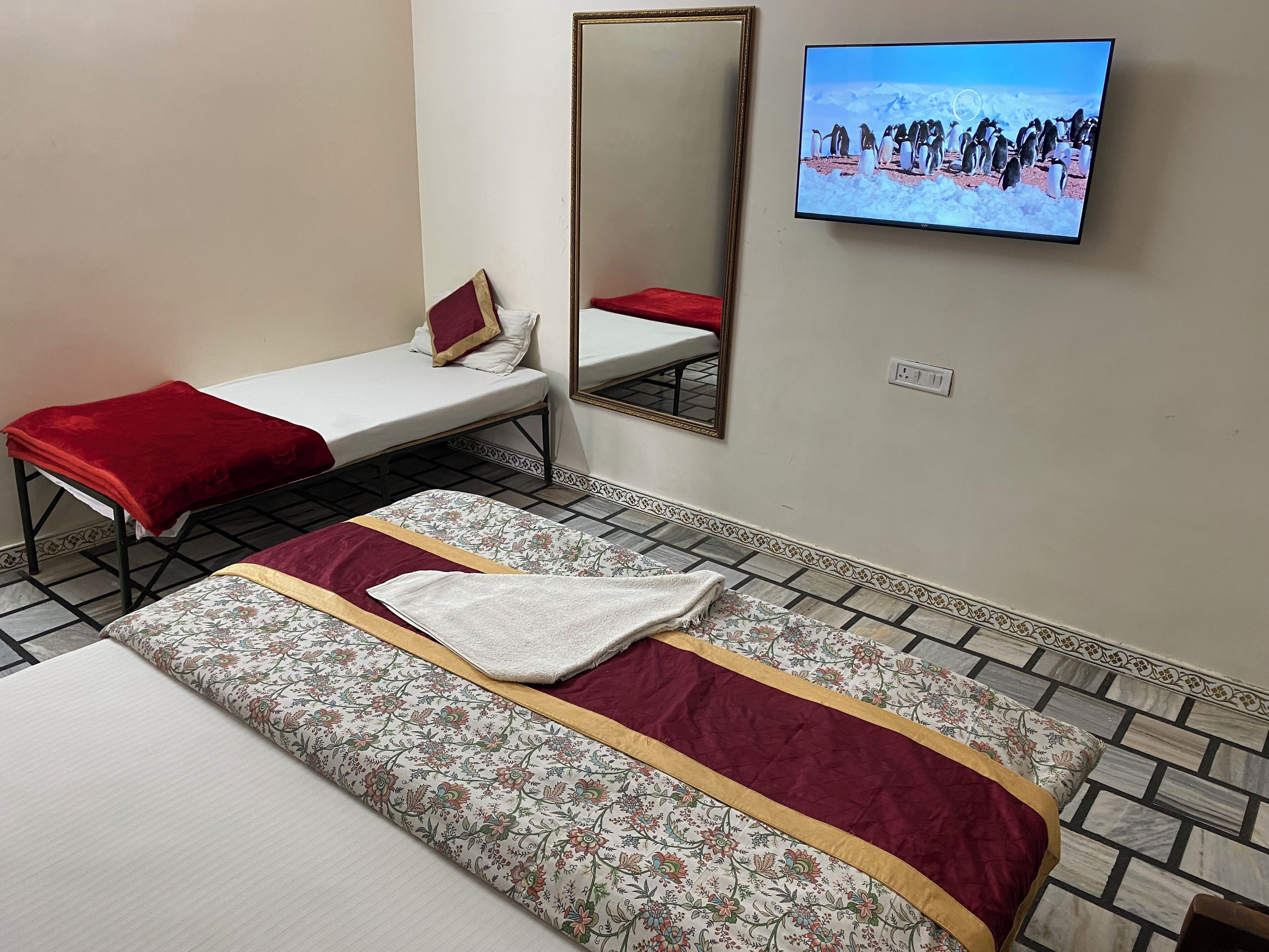 super deluxe queen bedroom | blackout curtains, free wifi, bed sheets