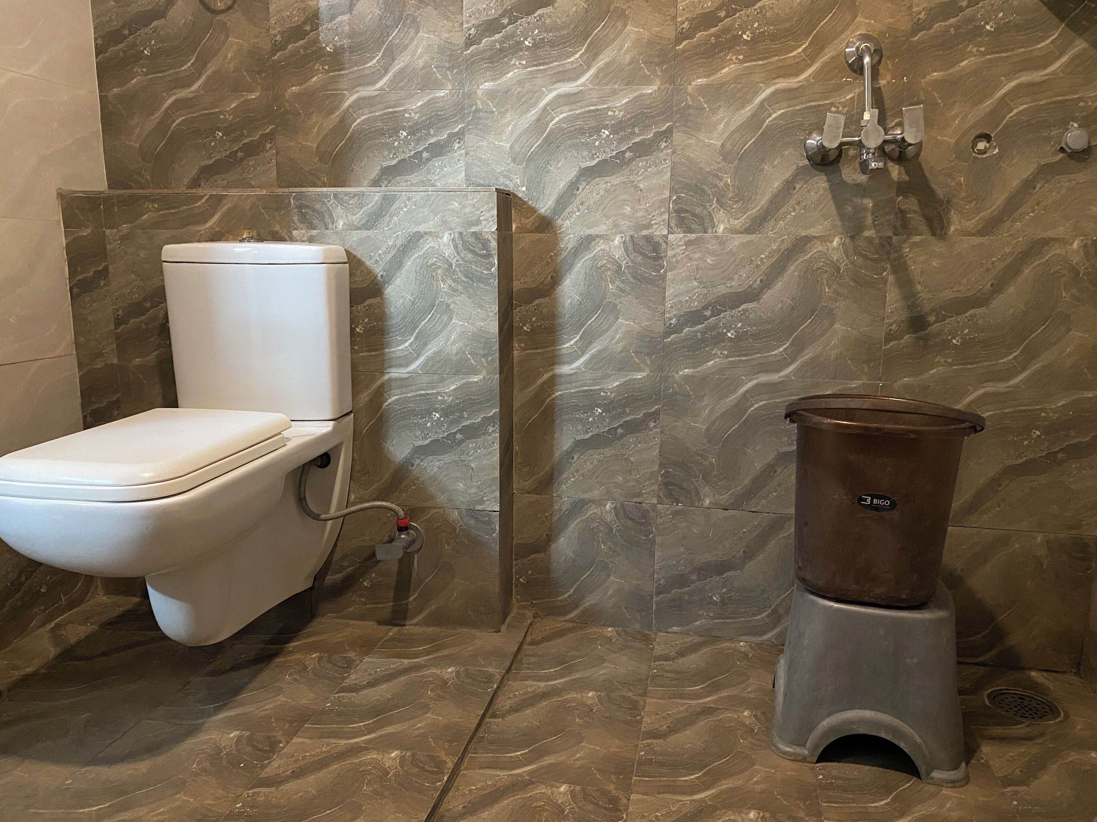 super deluxe king bedroom | bathroom | shower, towels, soap, toilet paper