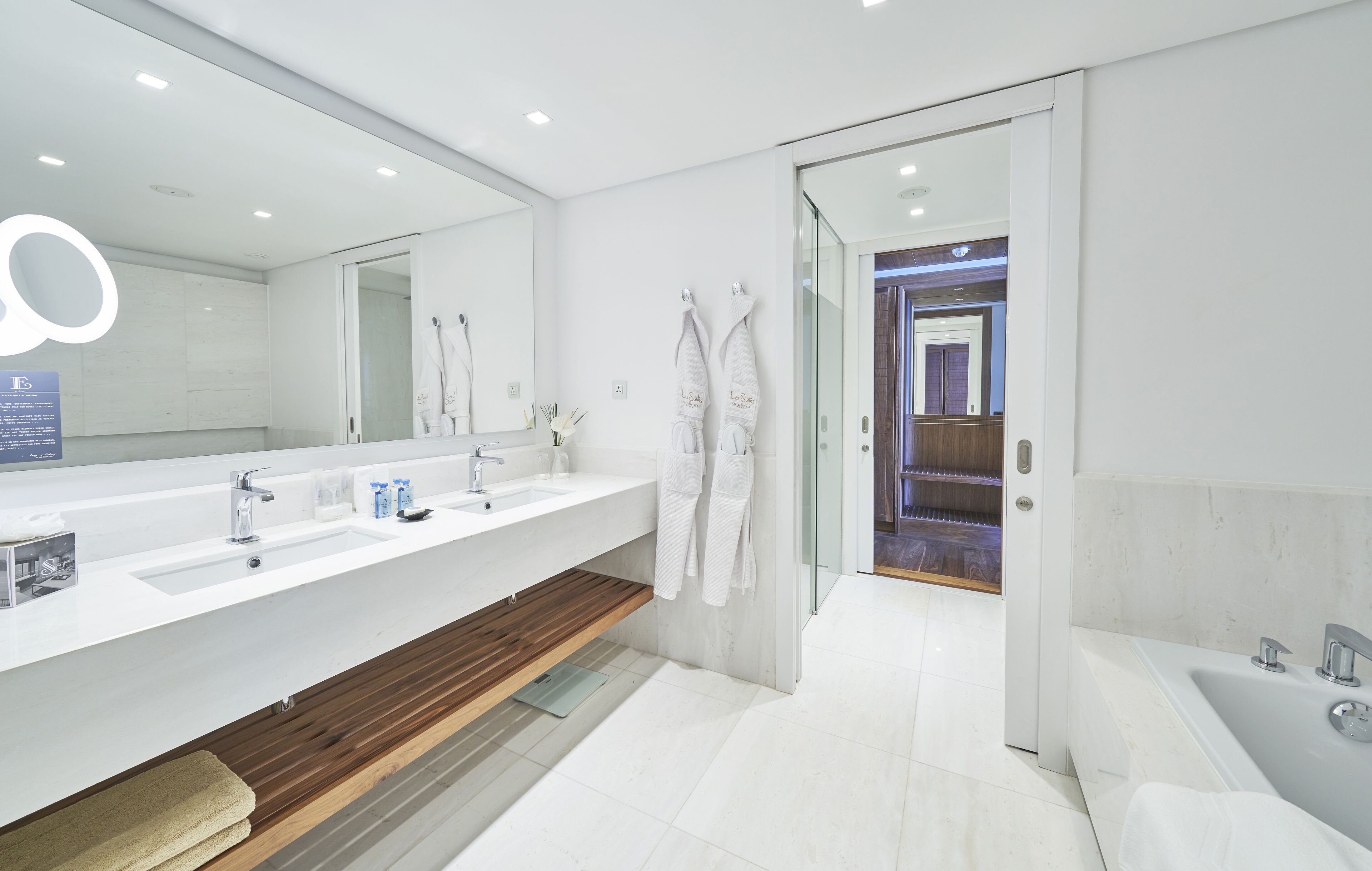 separate bathtub and shower, hair dryer, bathrobes, slippers