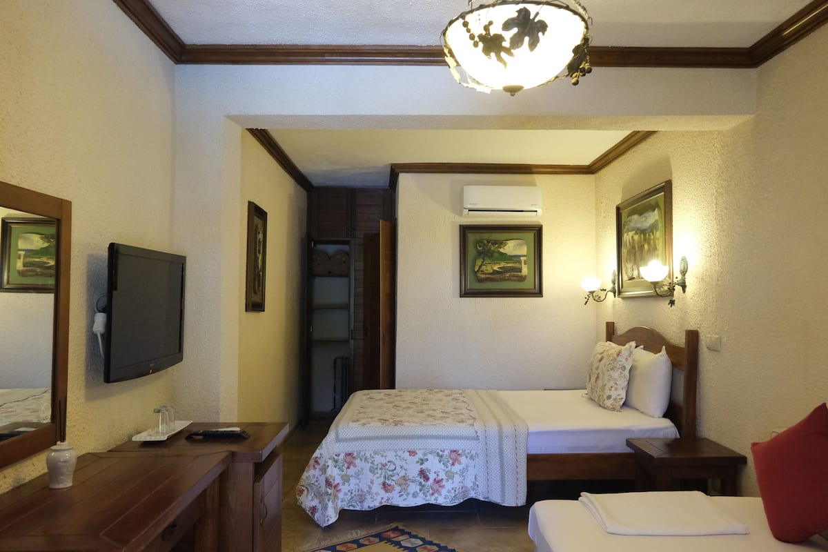 Standard Triple Room | 1 bedroom, premium bedding, minibar, individually decorated