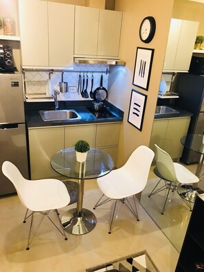 Comfort Studio | Private kitchenette | Full-size fridge, microwave, stovetop, electric kettle - Christine Suites at The Beacon Makati (Makati)