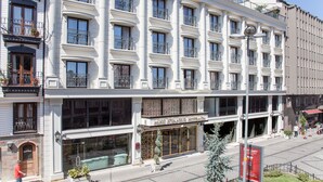 A multi-story building with a large entrance, balconies with metal railings, and a sign that reads "Miss Istanbul Hotel & Spa". - Miss Istanbul Hotel & Spa (Istanbul)