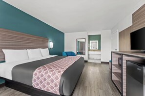 Habitación estándar, 1 cama King size, para no fumadores | Cortinas blackout, tabla de planchar con plancha y wifi gratis 