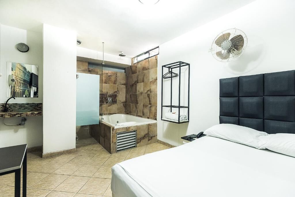 Habitación Confort | Tabla de planchar con plancha, wifi gratis y ropa de cama 