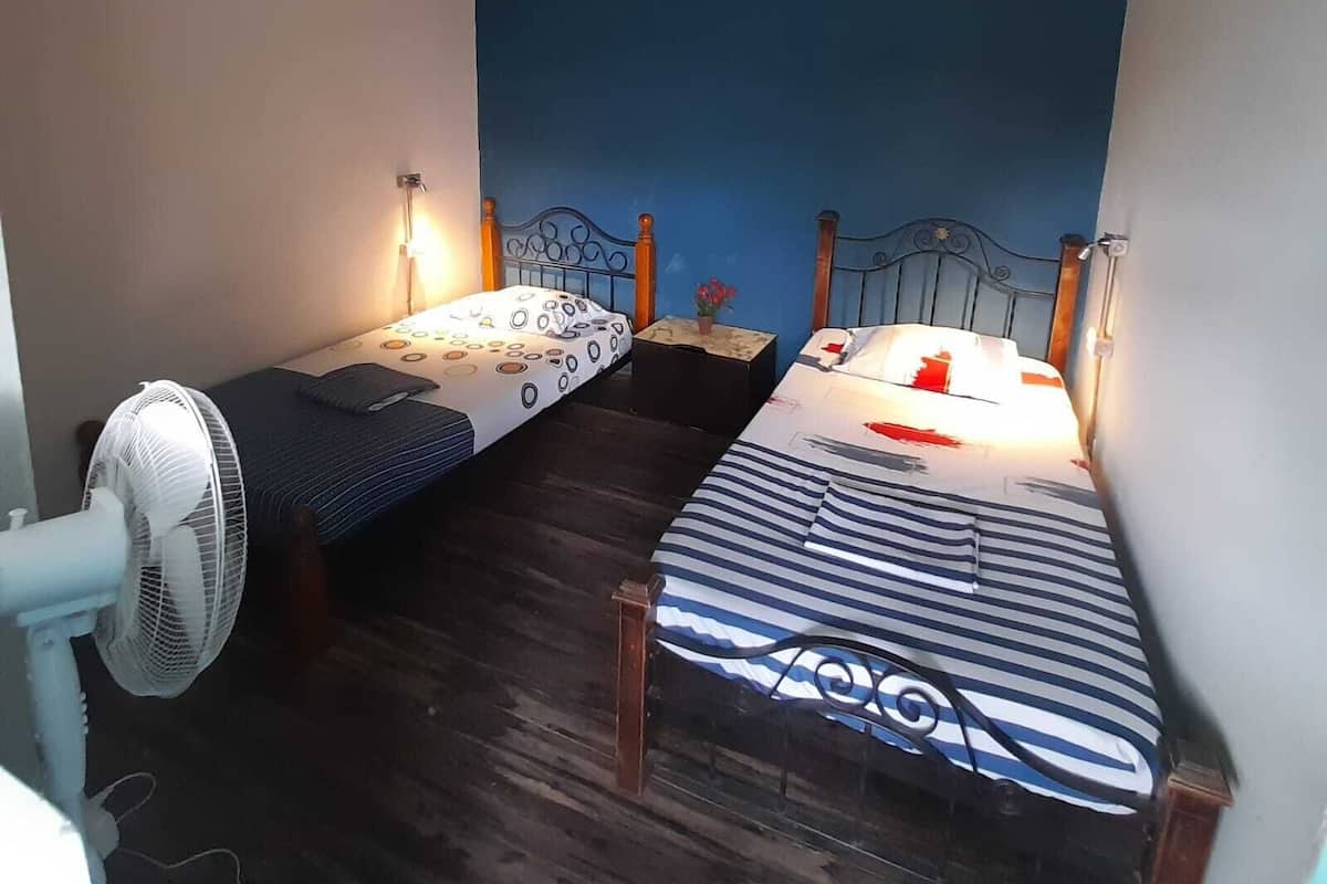 Shared Dormitory, 2 Single Beds, Shared Bathroom (No Window - Room 2) | Free WiFi