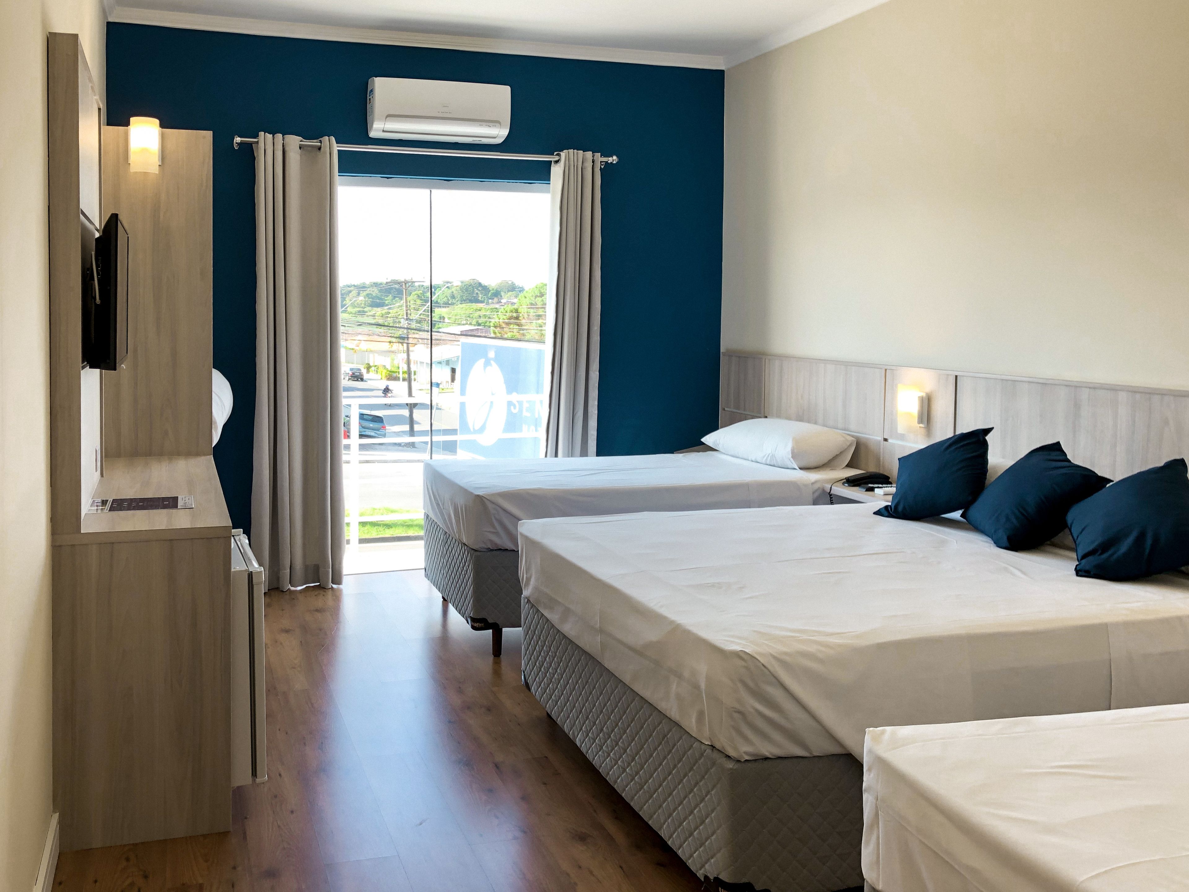 standard quadruple room, non smoking | 1 bedroom, minibar, in-room safe, individually decorated