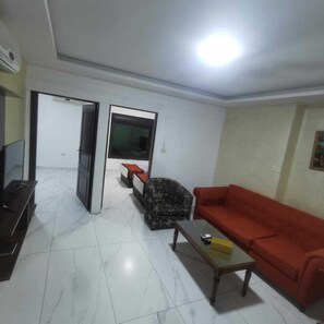Apartment, 2 Bedrooms | Blackout drapes, iron/ironing board, free WiFi, bed sheets