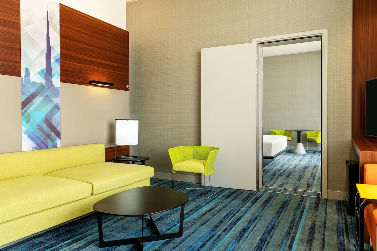 savvy suite king (living room + two bathrooms + shuttle to metro & al maktoum international airport) | living area | smart tv