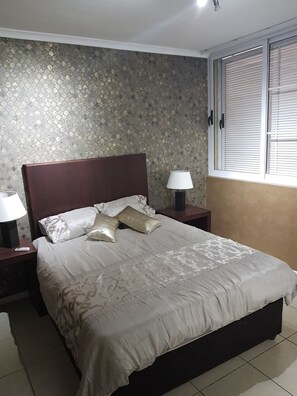 2 bedrooms, premium bedding, pillow-top beds, iron/ironing board