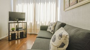 Apartamento estándar, 1 cama doble con sofá cama, no fumadores | Zona de estar