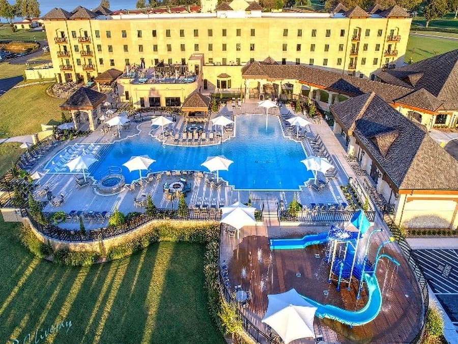 Indoor pool, outdoor pool, pool umbrellas, pool loungers