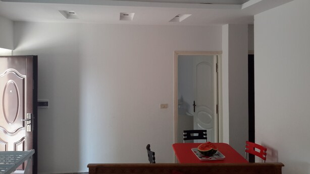 Family Apartment, Smoking | Living area | 32-inch flat-screen TV with satellite channels, TV - Appartements Aloui Foued (Tabarka)