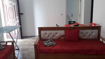 Family Apartment, Smoking | Living area | 32-inch flat-screen TV with satellite channels, TV