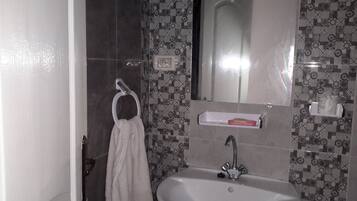 Family Apartment, Smoking | Bathroom | Shower, rainfall showerhead, free toiletries, hair dryer