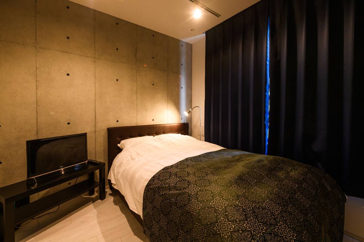 Blackout drapes, iron/ironing board, free WiFi, bed sheets