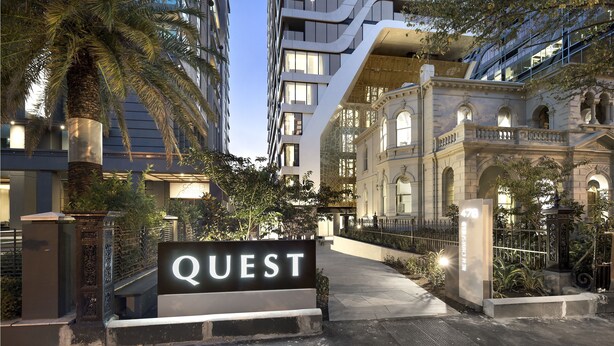 A modern building with a sign reading "QUEST" at the entrance. - Quest St Kilda Road (Melbourne)