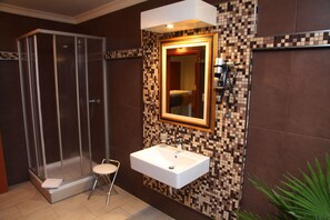 Shower, free toiletries, hair dryer, towels