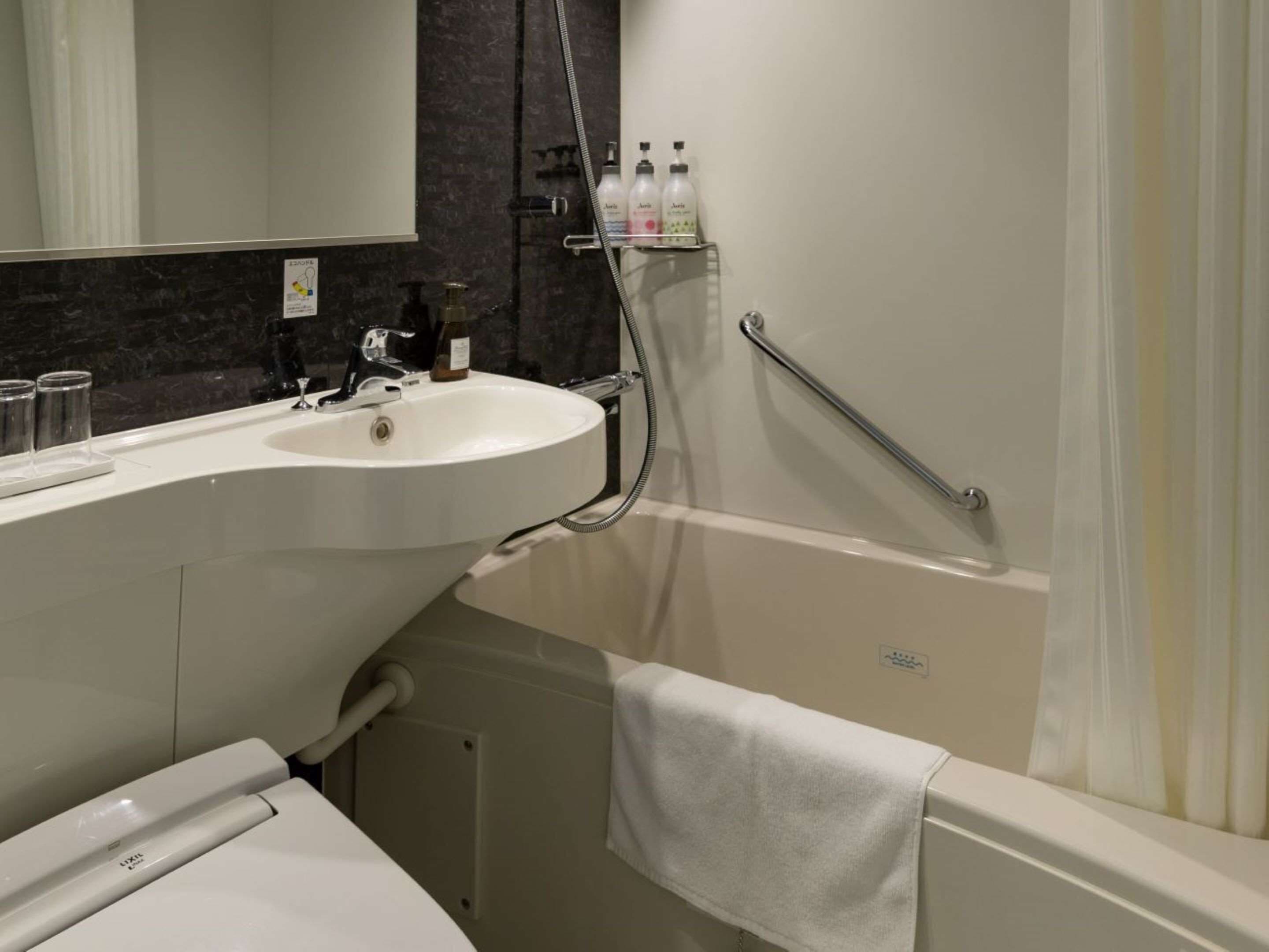 combined shower/bathtub, free toiletries, hair dryer, dressing gowns