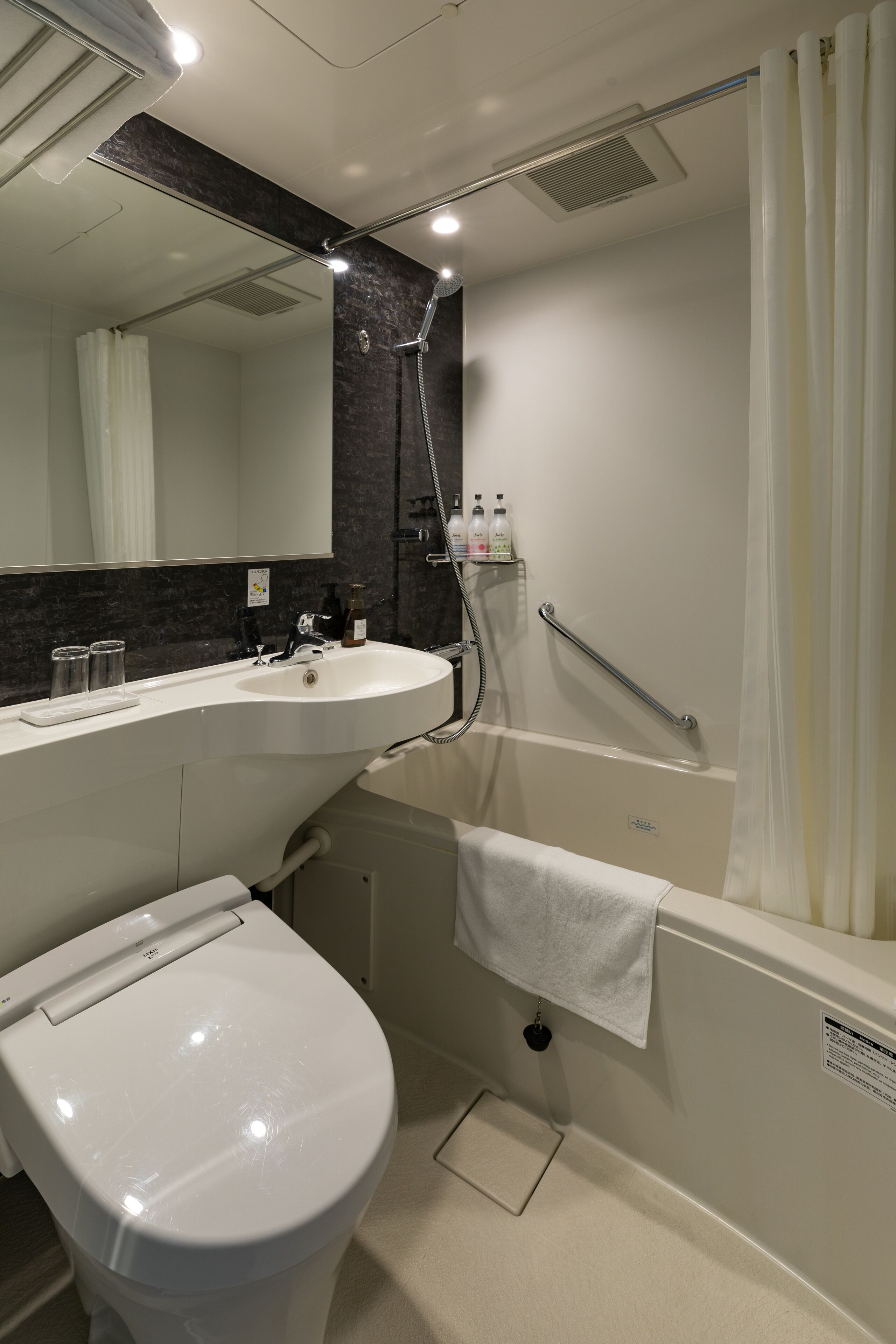 combined shower/bathtub, free toiletries, hair dryer, dressing gowns