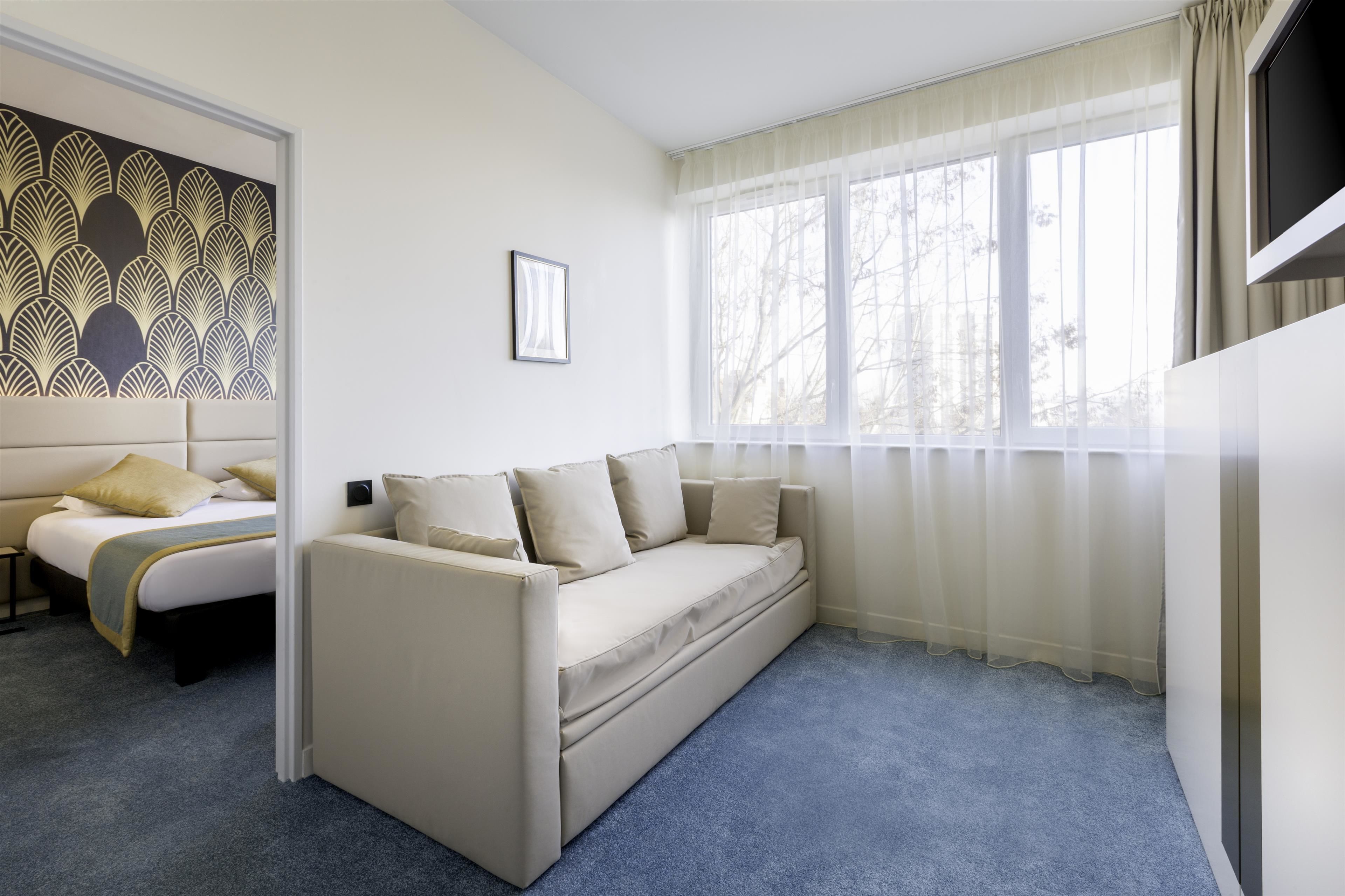 family room, 1 king bed with sofa bed, non smoking, kitchenette (with sofabed) | in-room safe, desk, blackout curtains, soundproofing