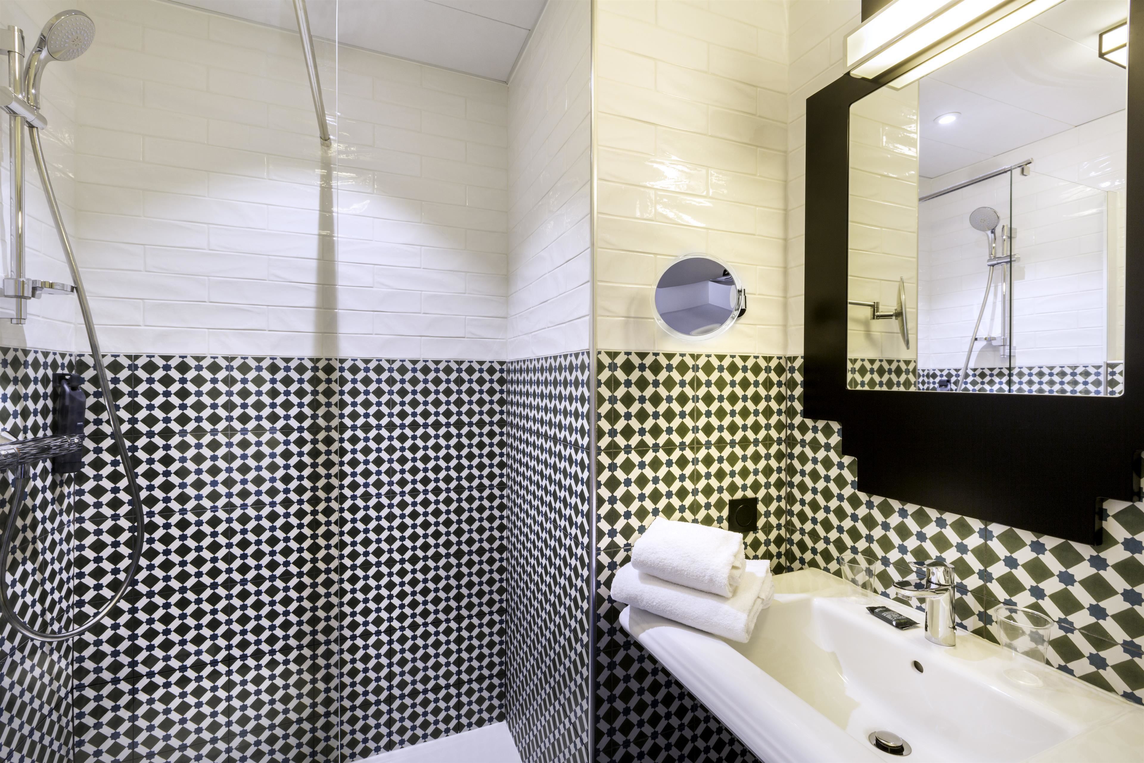 classic room, 1 king bed, non smoking (twin bed on request) | bathroom | shower, rainfall showerhead, free toiletries, hair dryer