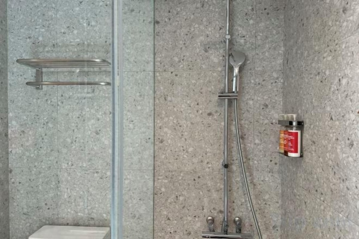 Bathroom | Eco-friendly toiletries, hair dryer, slippers, towels