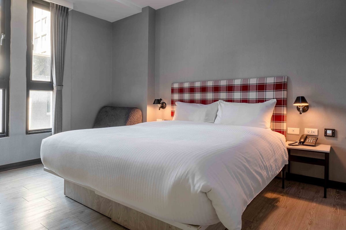 Superior tweepersoonskamer | Luxe beddengoed, een bureau, geluiddichte muren, gratis wifi