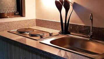 Studio | Private kitchenette | Full-size fridge, microwave, stovetop, electric kettle