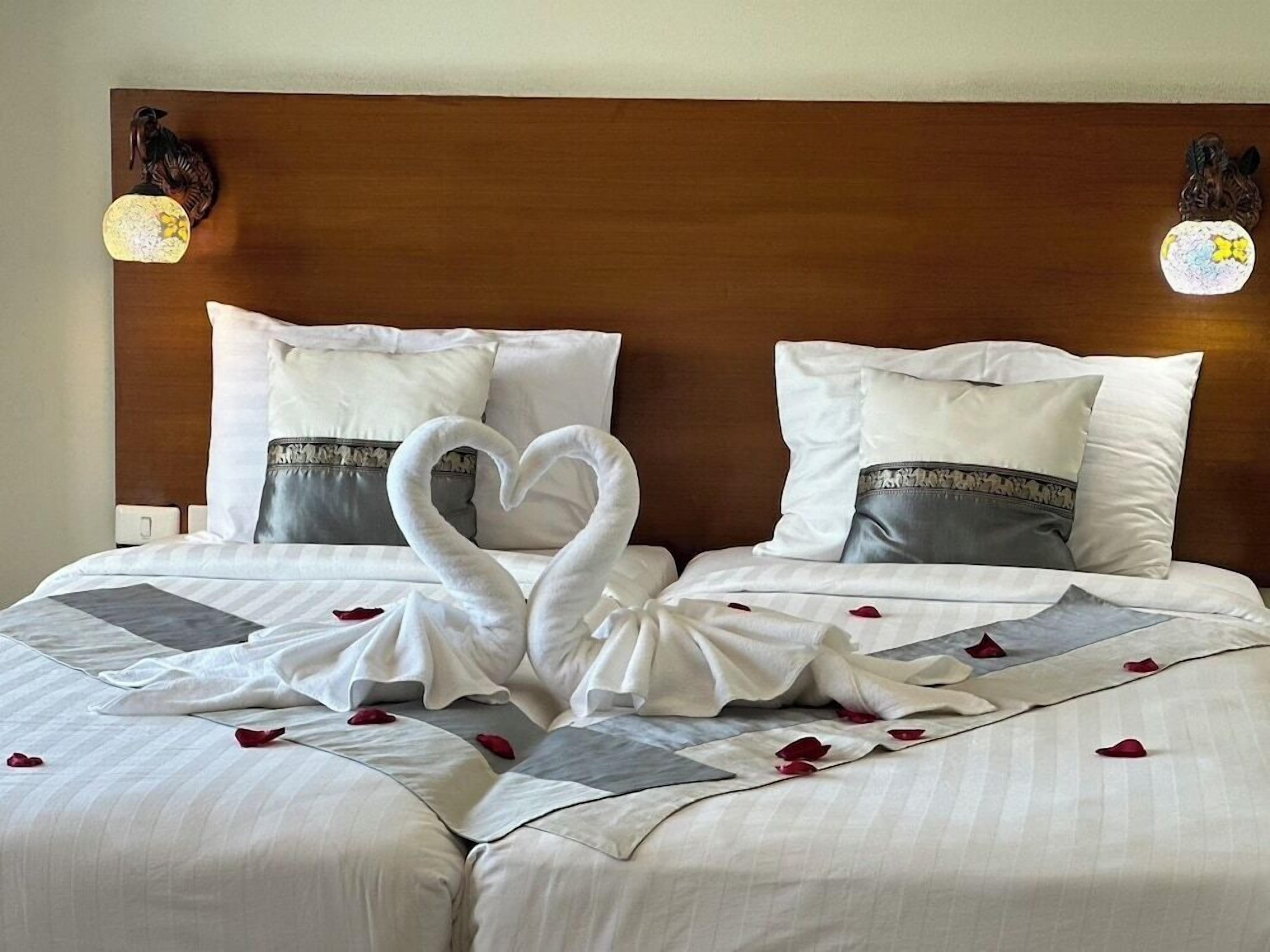 Premium bedding, free minibar, in-room safe, desk