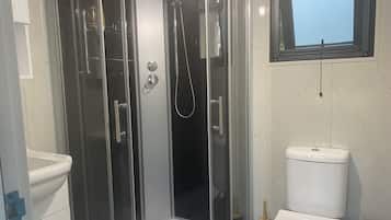 Premier Cabin | Bathroom | Free toiletries, hair dryer, towels, soap