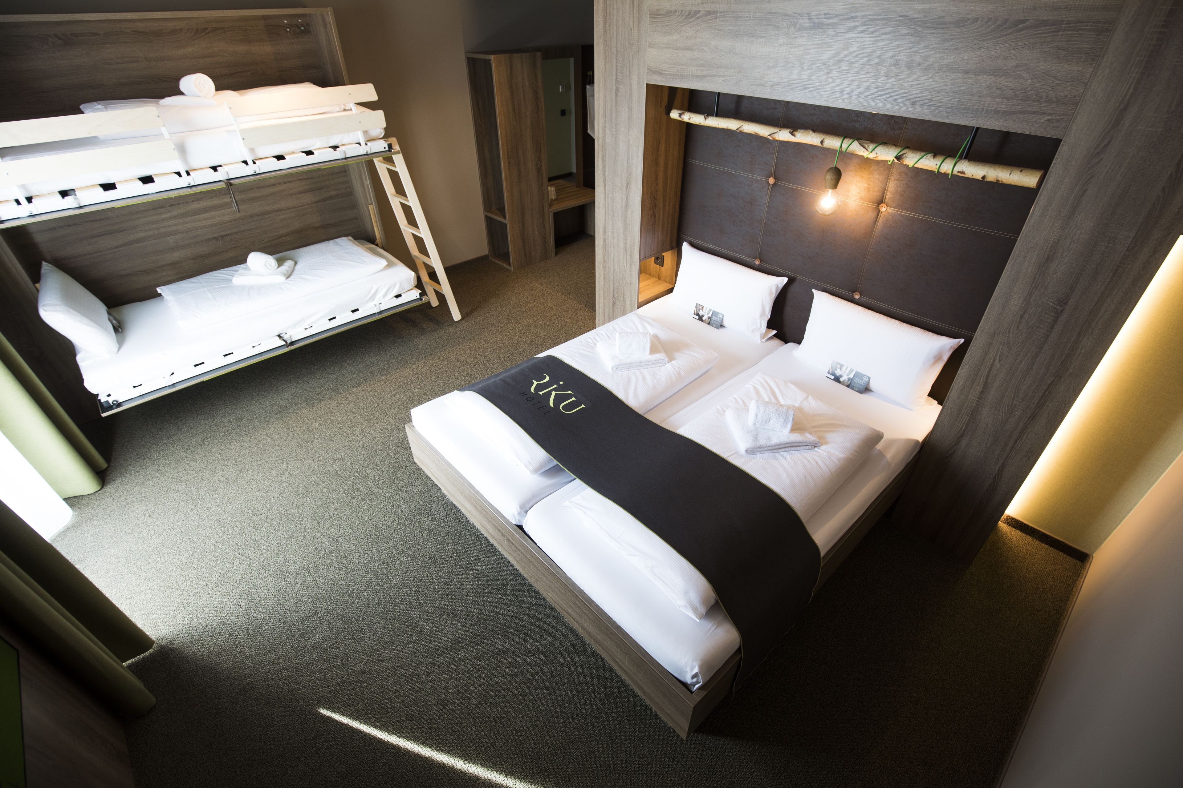 family room | hypo-allergenic bedding, desk, blackout curtains, soundproofing