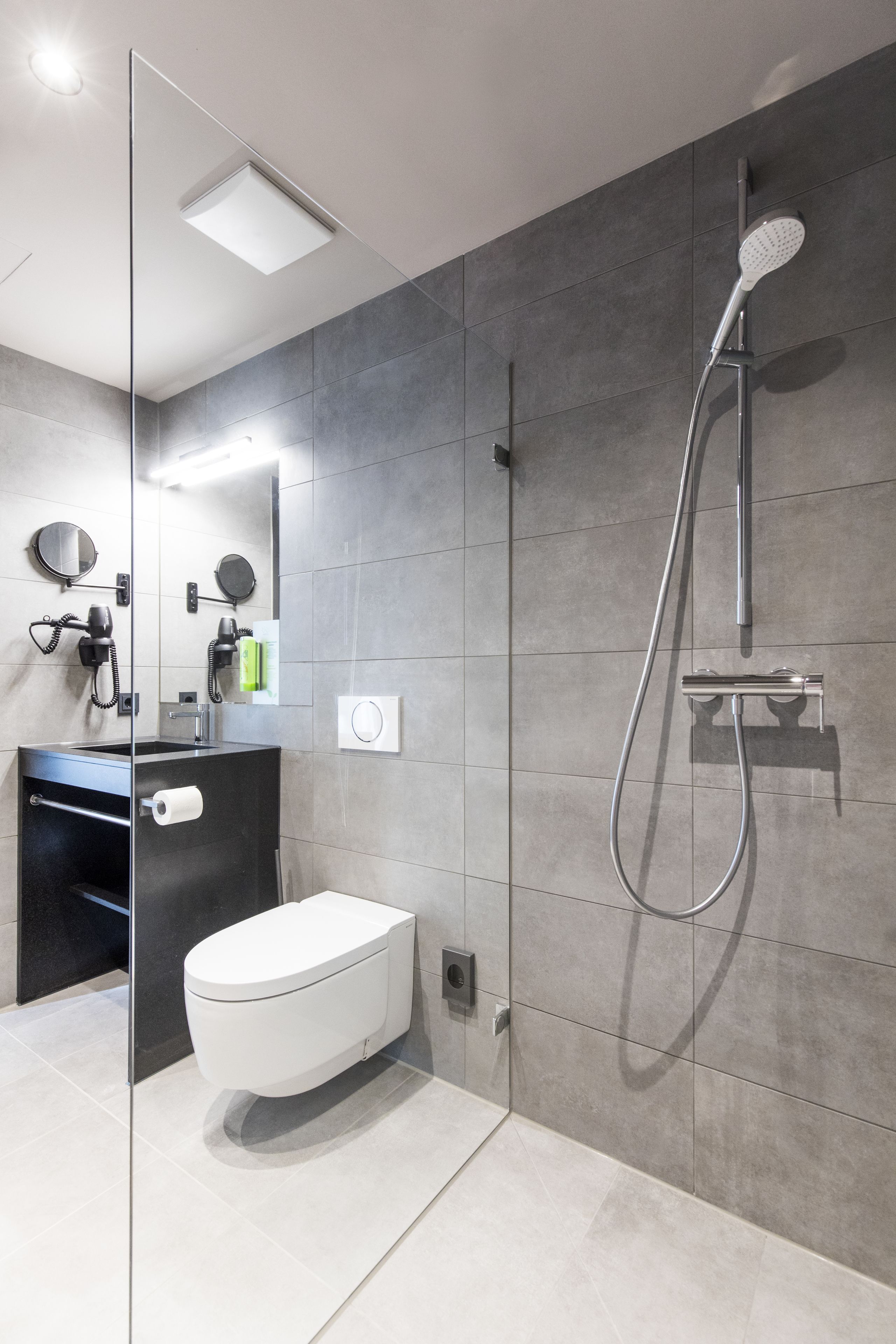 shower, hair dryer, heated floors, towels