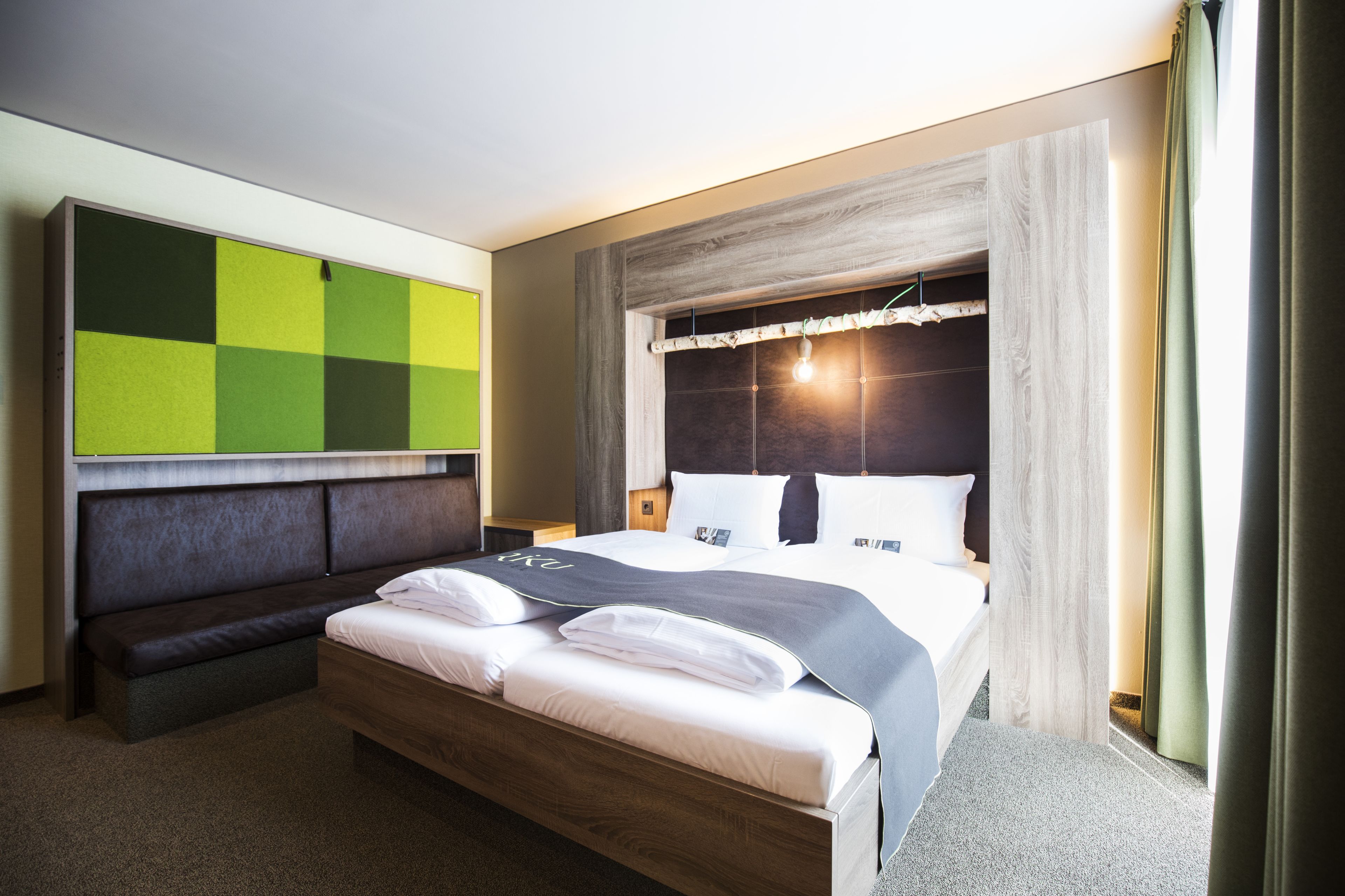 family room | hypo-allergenic bedding, desk, blackout curtains, soundproofing