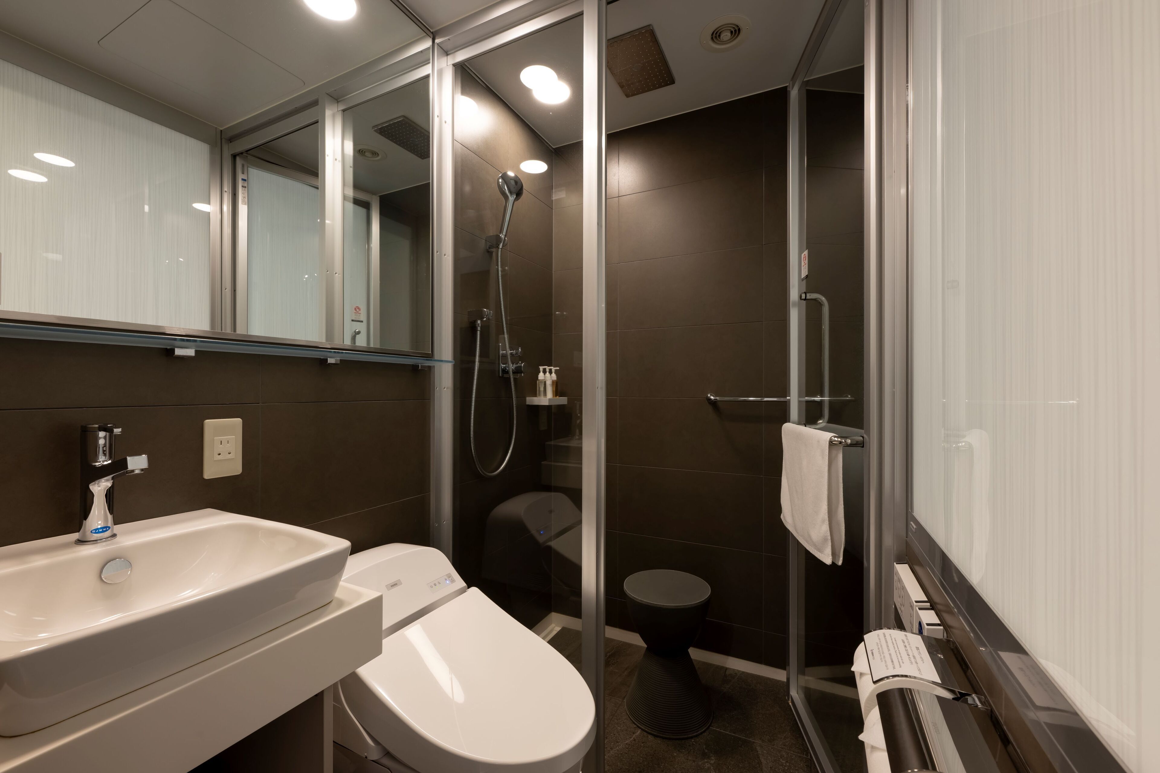 eco-friendly toiletries, hair dryer, slippers, bidet