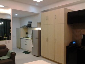Condo, 1 Bedroom | Living area | LED TV - Twin Oaks Place Units (Mandaluyong)