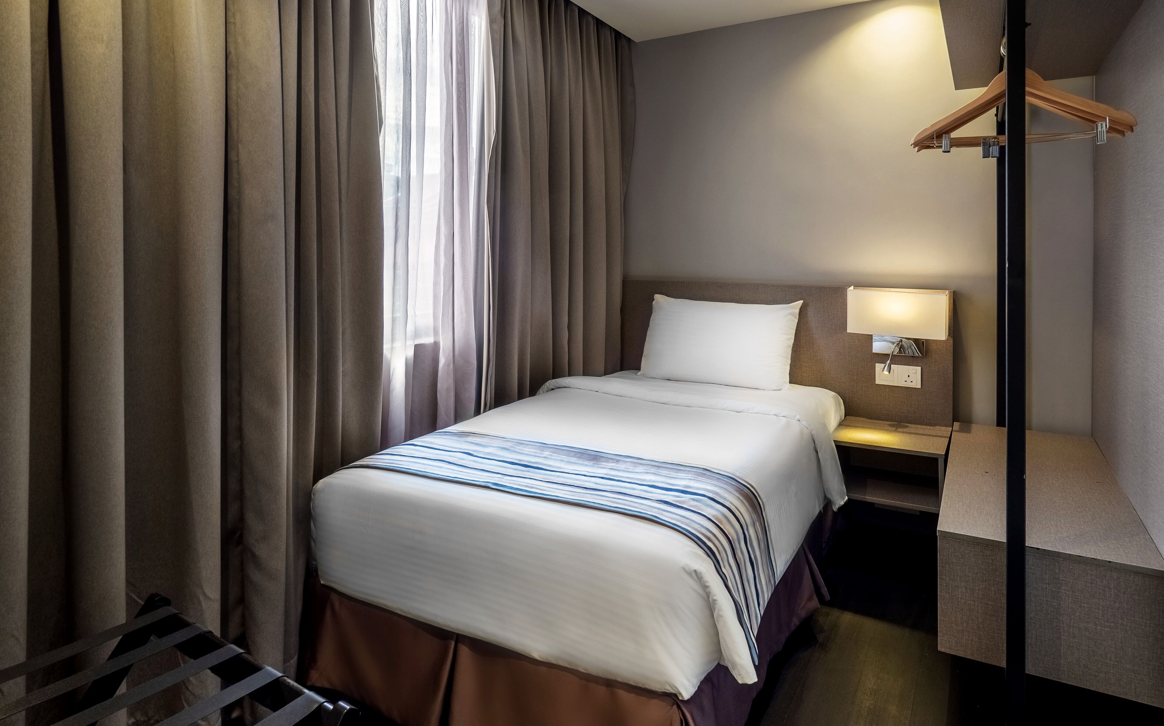 family suite, 3 bedrooms, non smoking, city view | minibar, in-room safe, individually furnished, desk