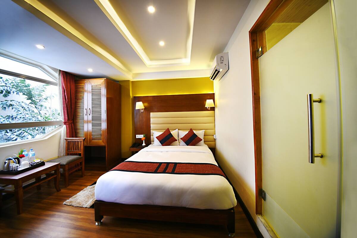 Deluxe Double Room, 1 Queen Bed (Complimentary Airport Pick-up) | Premium bedding, soundproofing, iron/ironing board (on request)