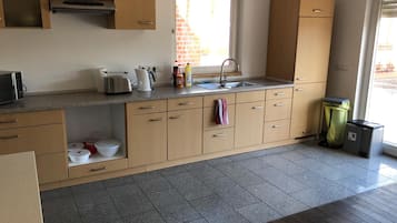 Fridge, microwave, coffee/tea maker, toaster