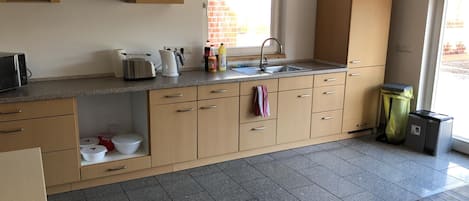 Fridge, microwave, coffee/tea maker, toaster