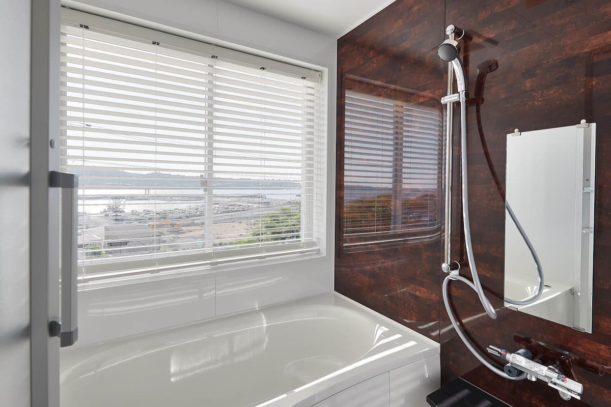 standard quadruple room | bathroom | separate bathtub and shower, hair dryer, bathrobes, slippers