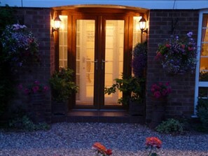 Front of property - evening/night