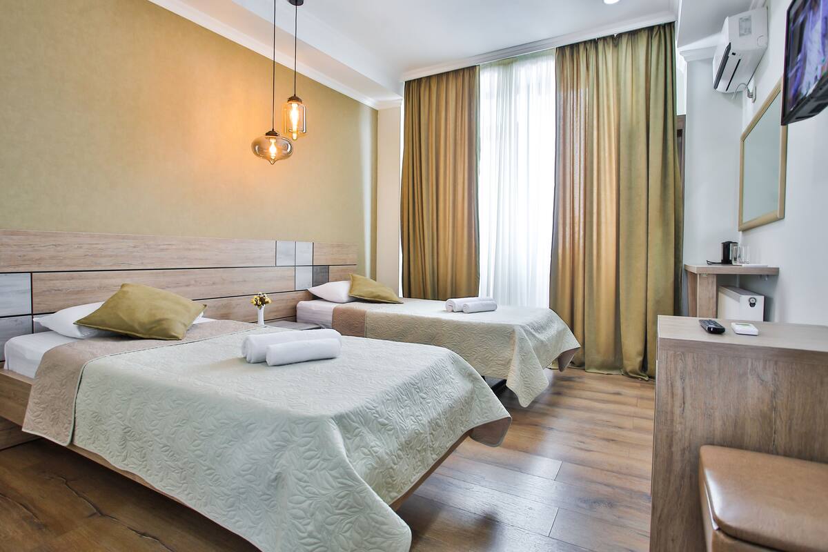 panoramic double or twin room, multiple beds, non smoking | individually decorated, individually furnished, desk, blackout curtains